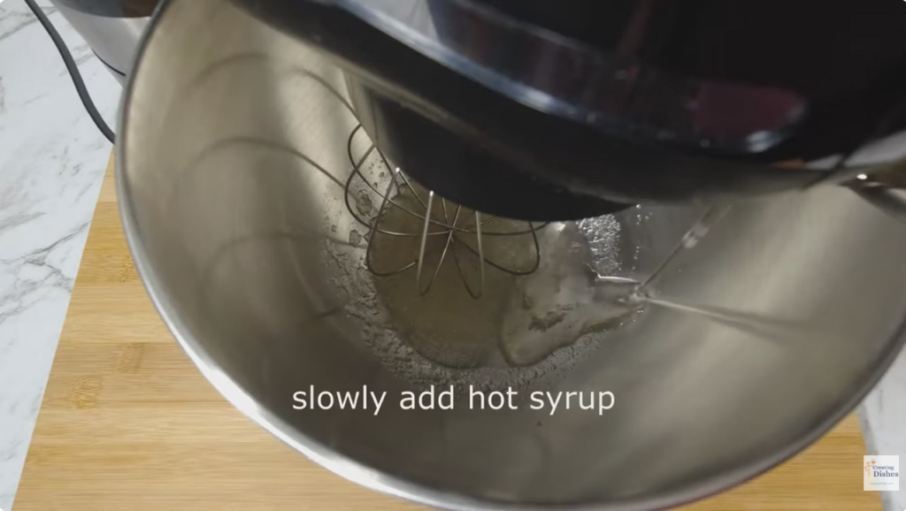  hot sugar syrup to the bloomed gelatine in your stand mixer bowl