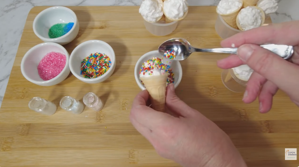 Decorate with hundreds and thousands while the marshmallow is still soft so they stick