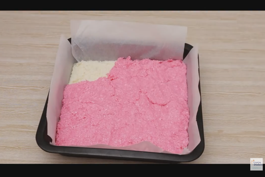 Adding pink colouring to the coconut ice mixture.