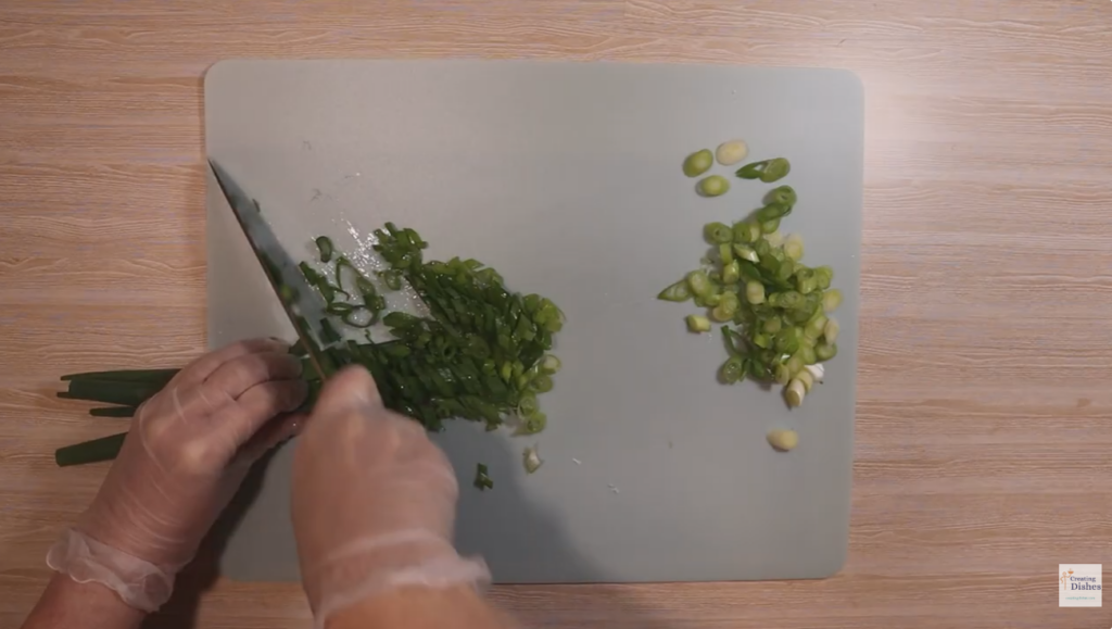 Spring Onion sliced, separating white/light green and dark green 