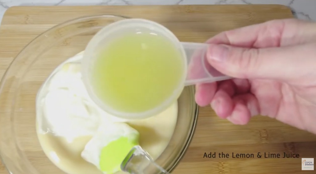 Filling for the pie in a glass bowl, about to add juice.